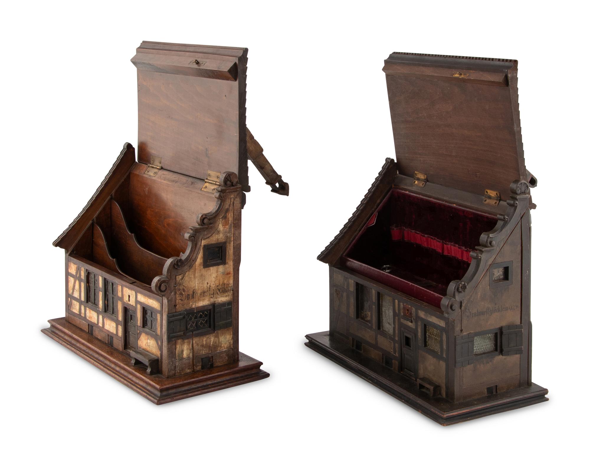 A Pair of German Carved and Painted Timber House-Form Boxes