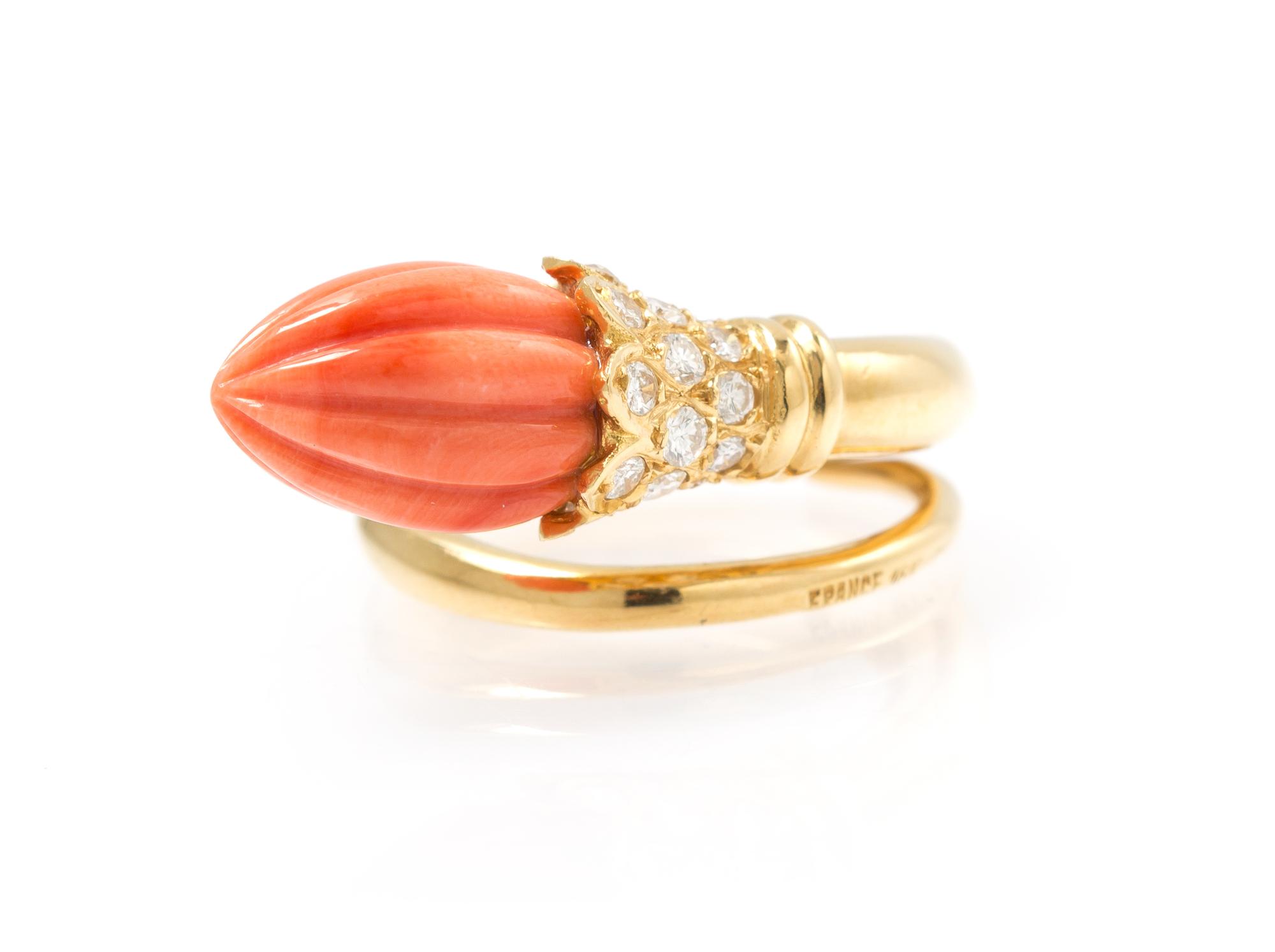 An 18 Karat Yellow Gold, Diamond and Coral Ring, 5.95 dwts.
