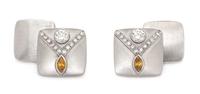 A Pair of Platinum, Diamond and Orange Diamond Cufflinks,