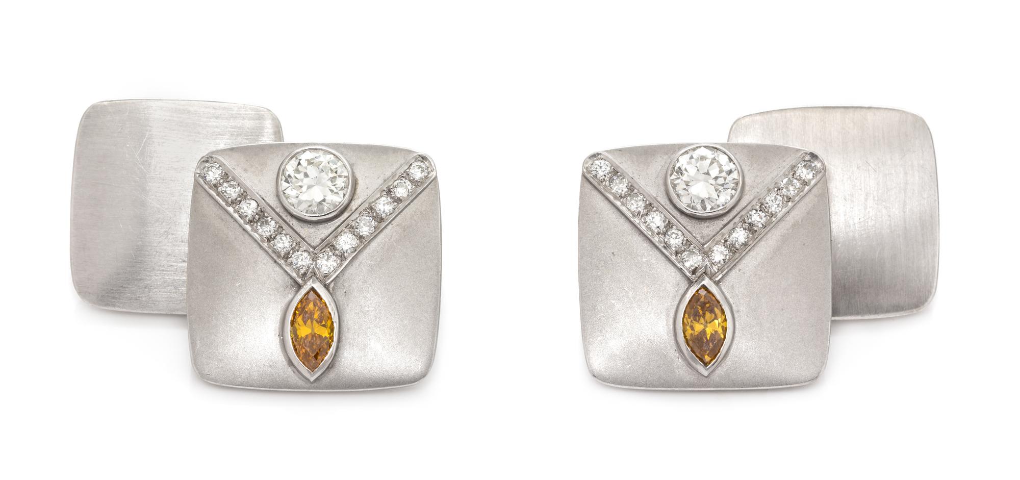 A Pair of Platinum, Diamond and Orange Diamond Cufflinks,