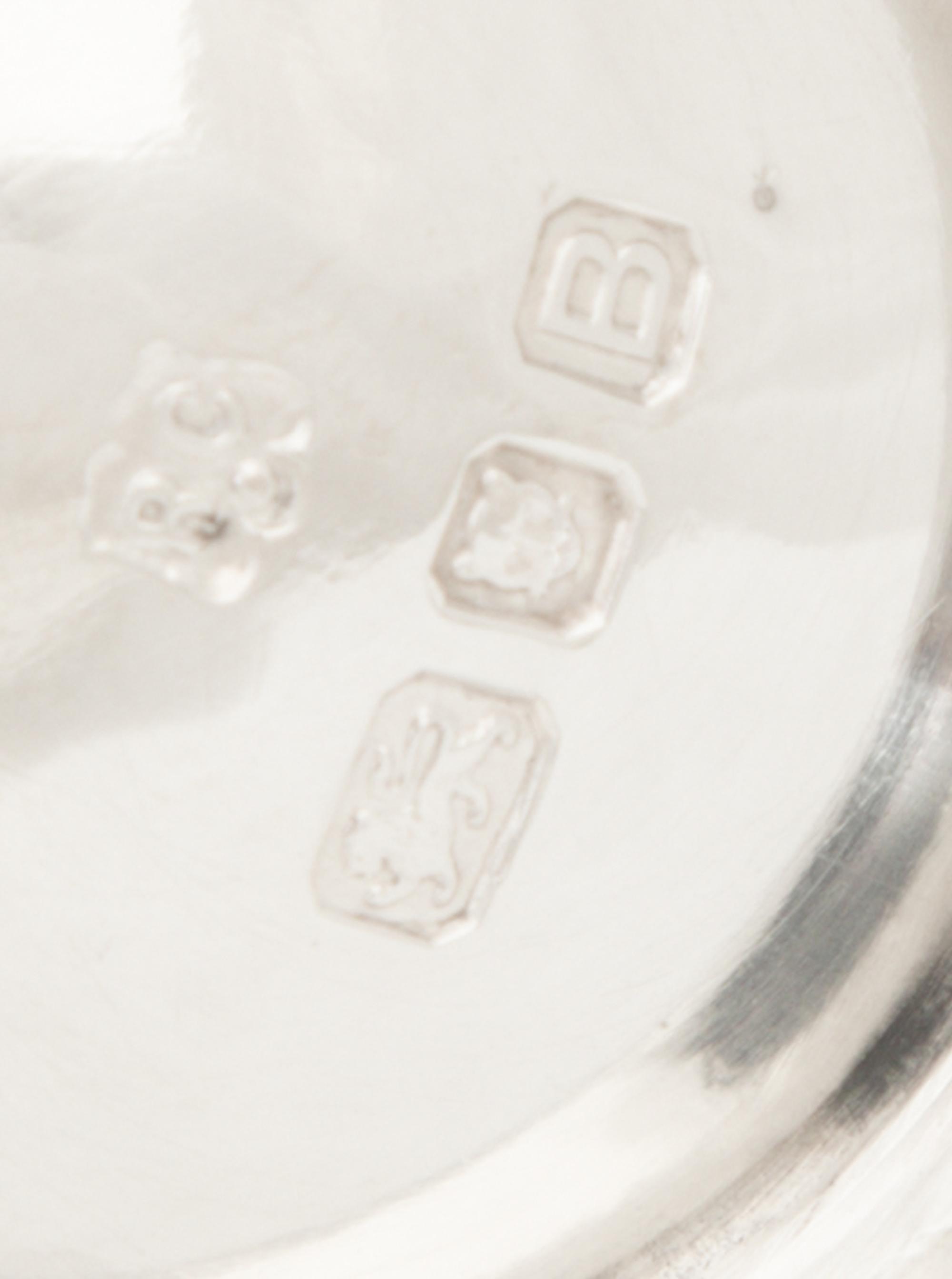 An English Queen Anne Style Silver Five-Piece Tea and Coffee Service