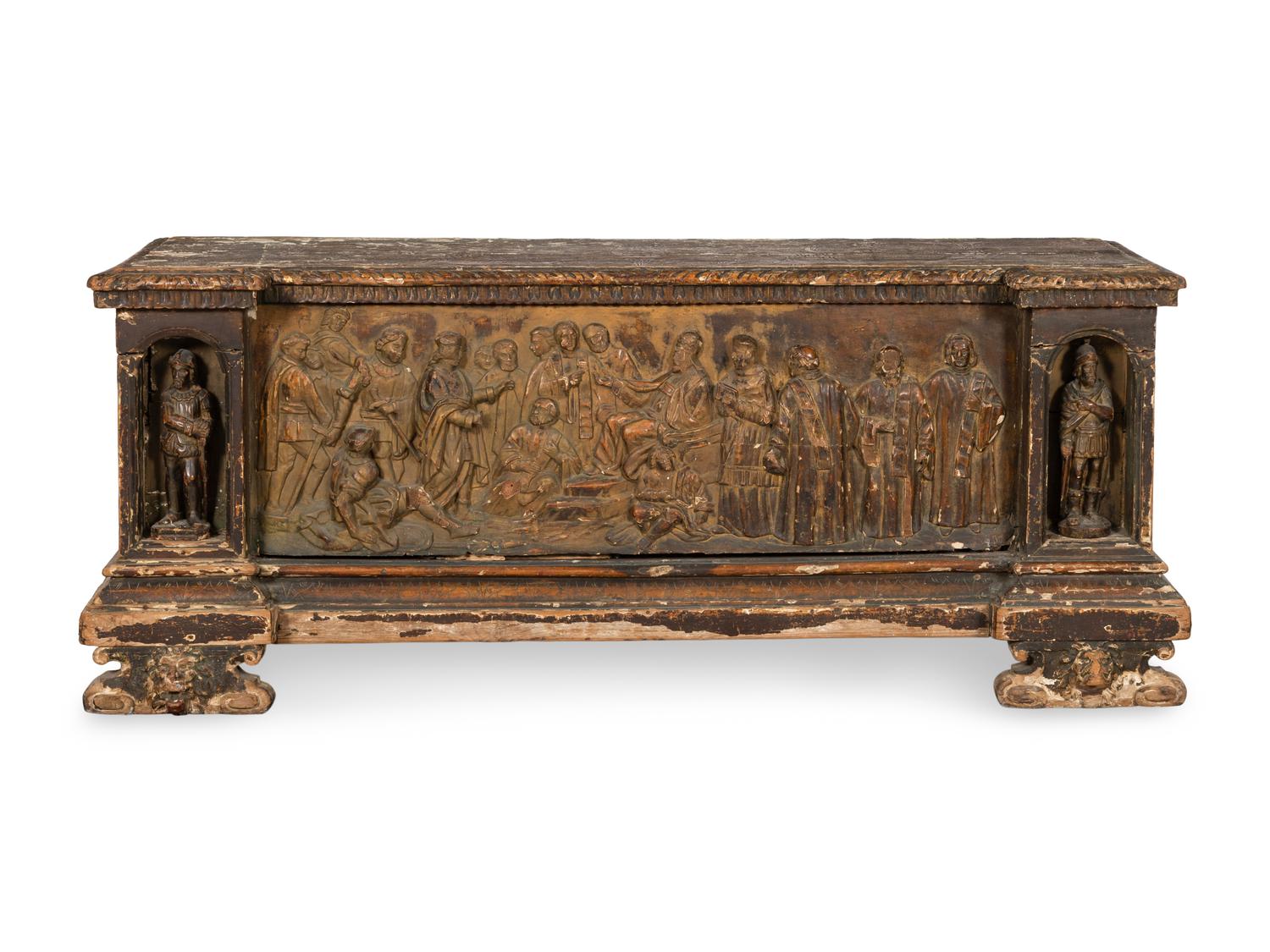 A Continental Baroque Carved Cassone with Carved Relief Panel
