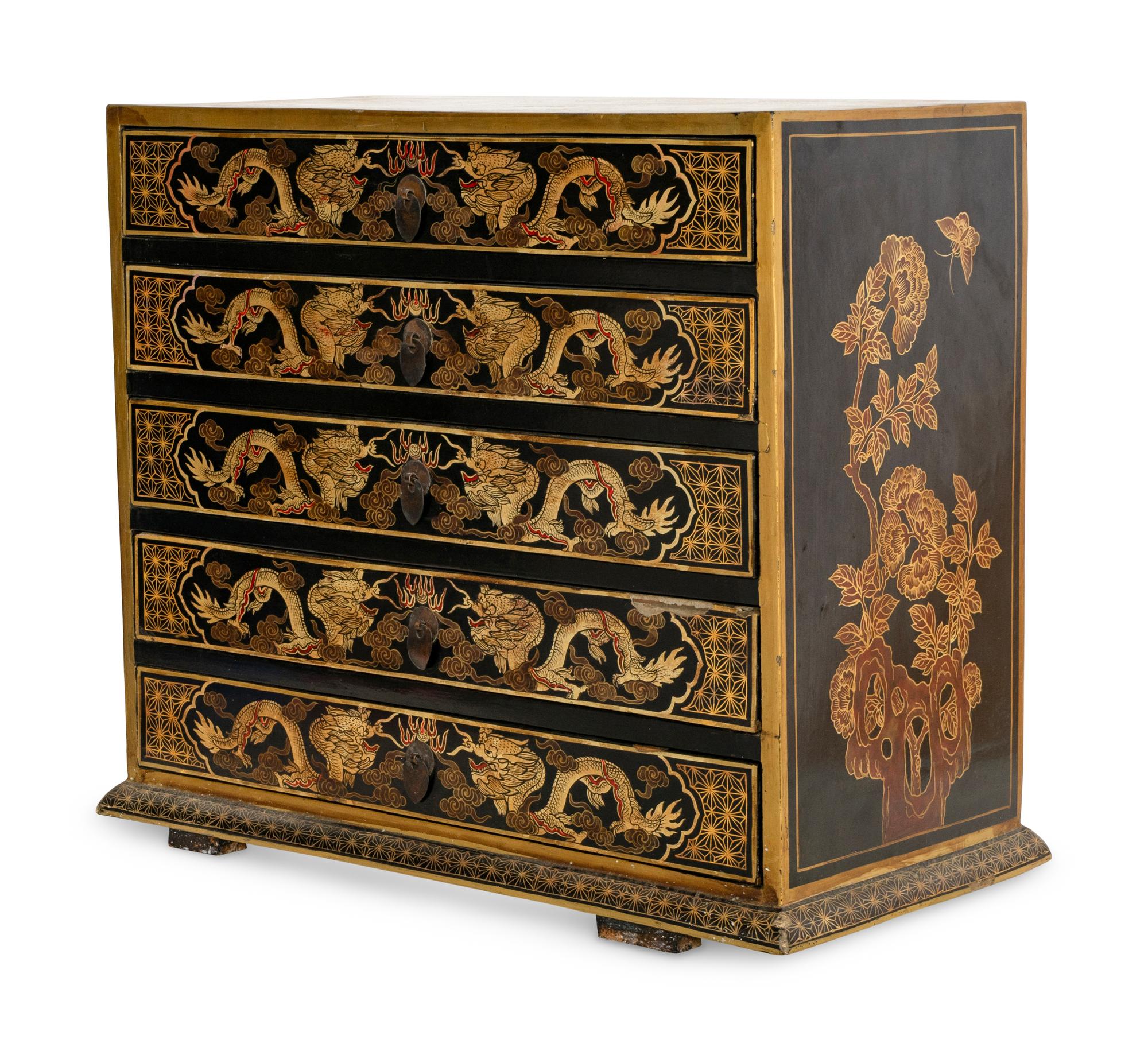 A Korean Parcel Gilt and Paint Decorated Diminutive Chest of Drawers