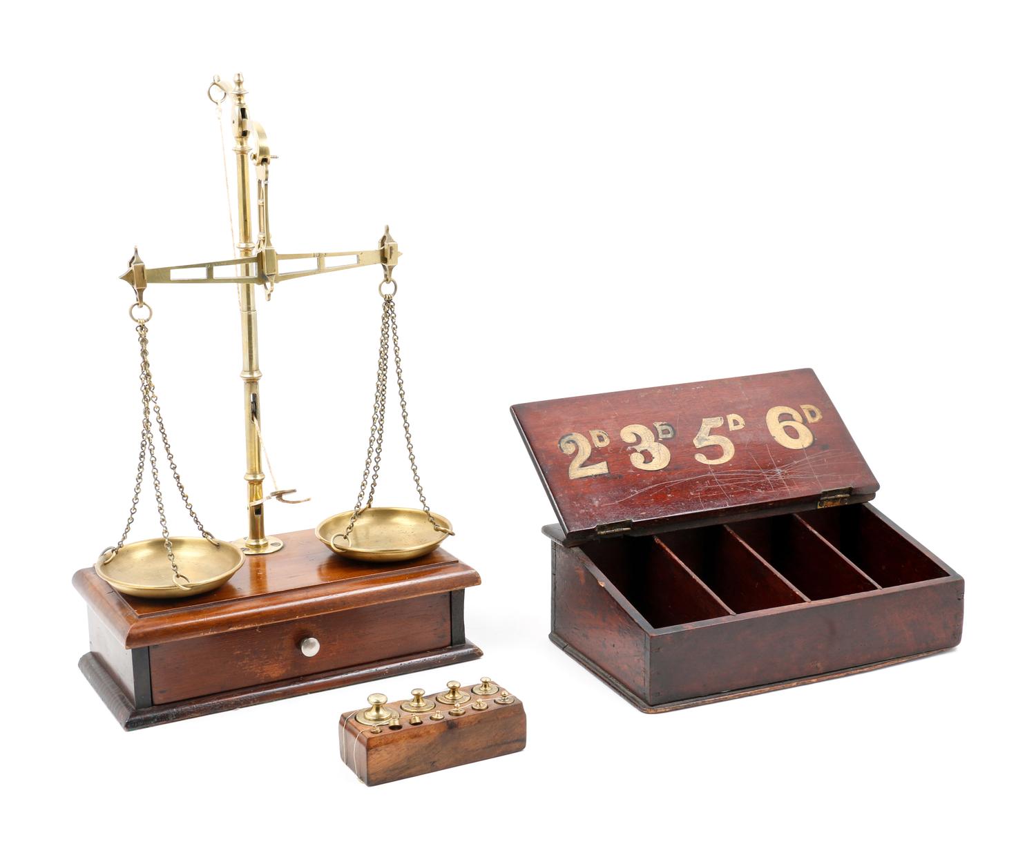 A Brass Balance and a Parcel Gilt Decorated Retail Cigar Box