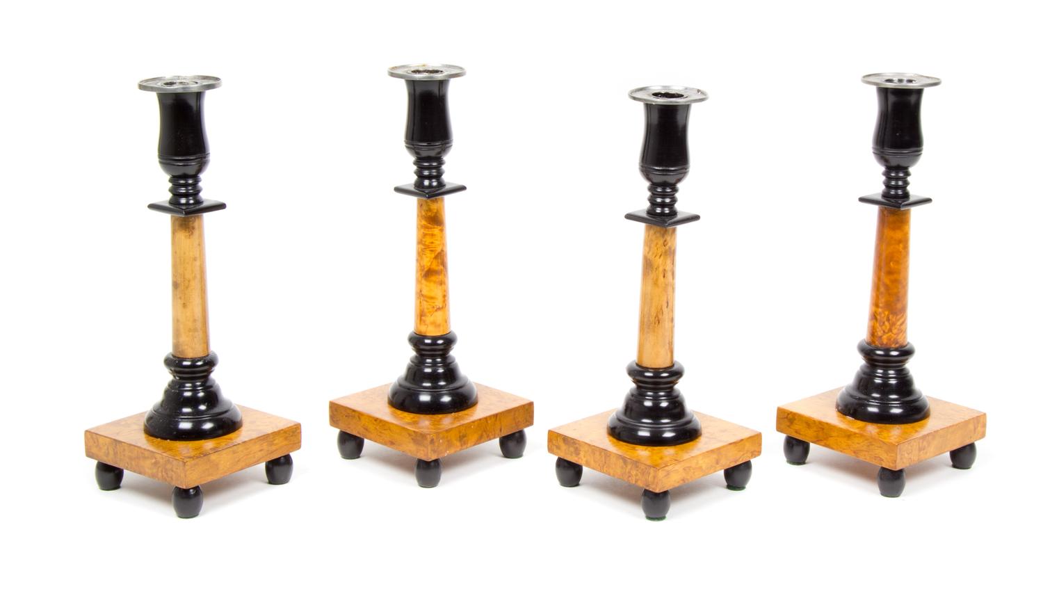 A Set of Four Swedish Parcel Ebonized Burlwood Candlesticks Height 10 3/8 inches. — 19TH CENTURY