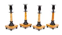 A Set of Four Swedish Parcel Ebonized Burlwood Candlesticks Height 10 3/8 inches. — 19TH CENTURY