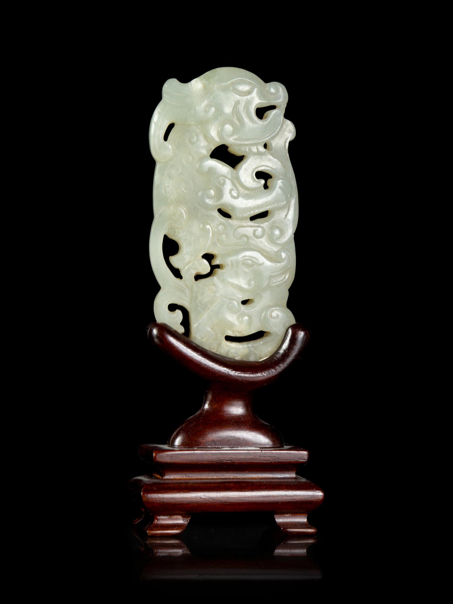 A Pale Celadon Jade 'Phoenix' Pendant