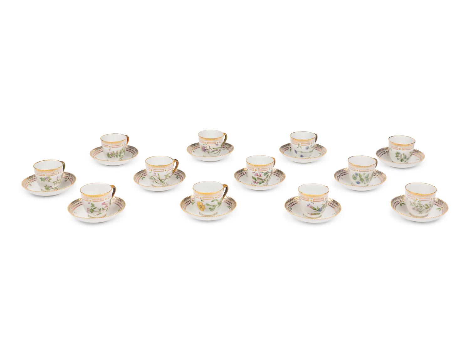 A Set of Twelve Royal Copenhagen Flora Danica Porcelain Teacups and Saucers