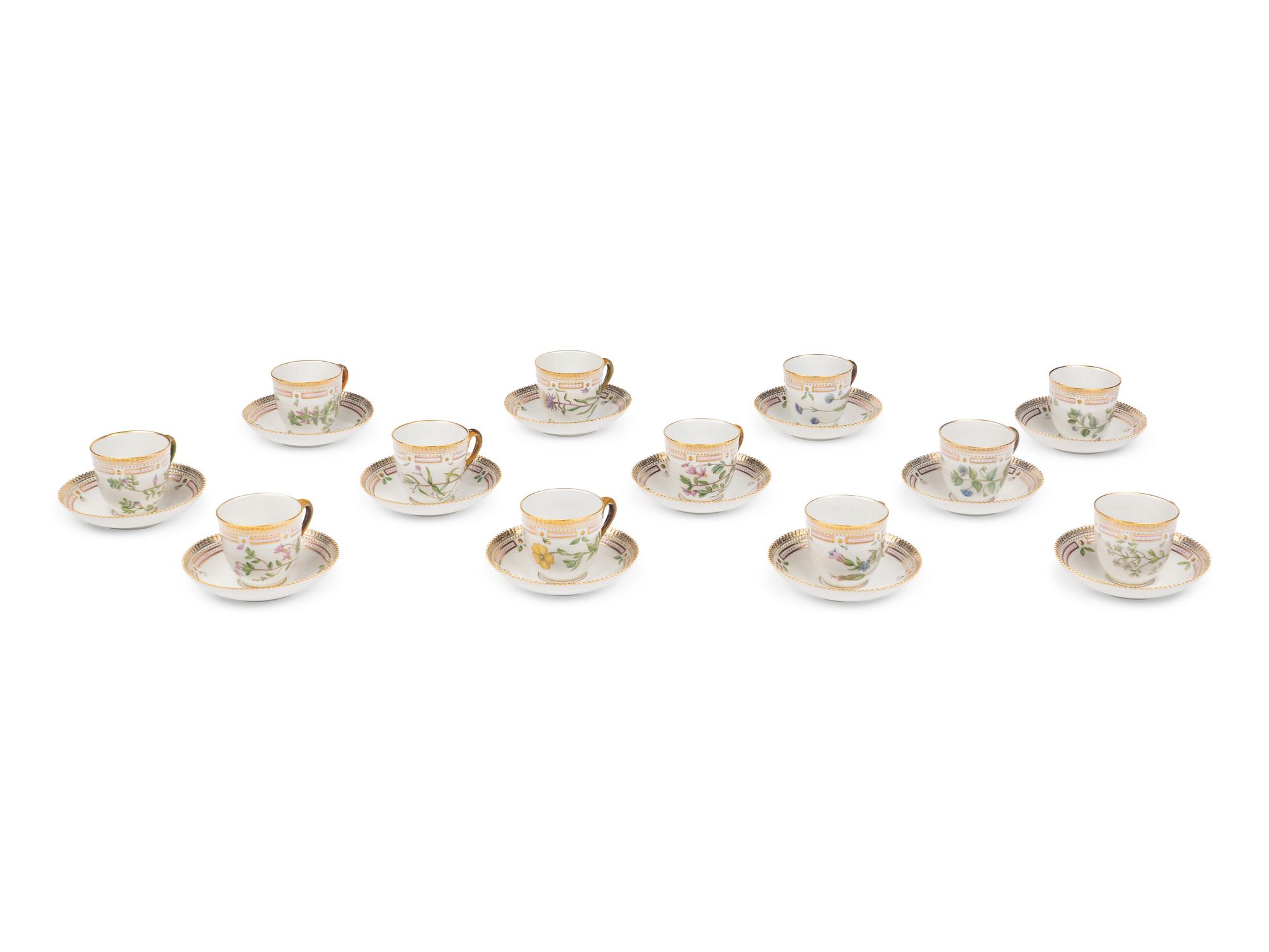 A Set of Twelve Royal Copenhagen Flora Danica Porcelain Teacups and Saucers