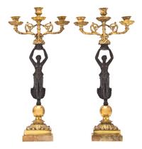 A Pair of Empire Style Gilt and Patinated Bronze Three-Light Figural Candelabra, Height 21 inches.
