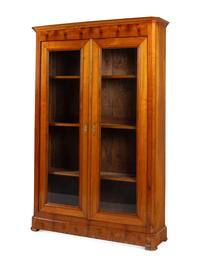 A Biedermeier Figured Walnut Two-Door Bookcase