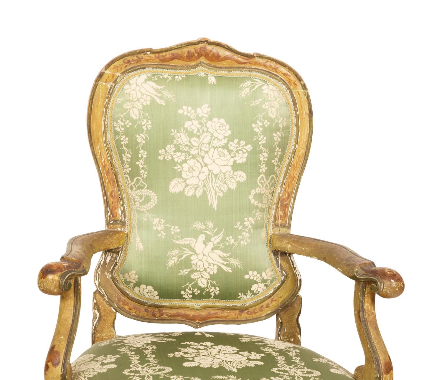 A Pair of Italian Painted and Parcel Gilt Open Armchairs