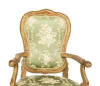 A Pair of Italian Painted and Parcel Gilt Open Armchairs