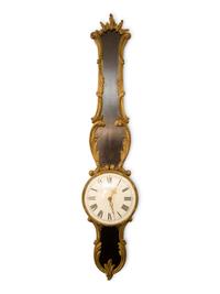 A French Empire Style Ebonized and Parcel Gilt Banjo Clock