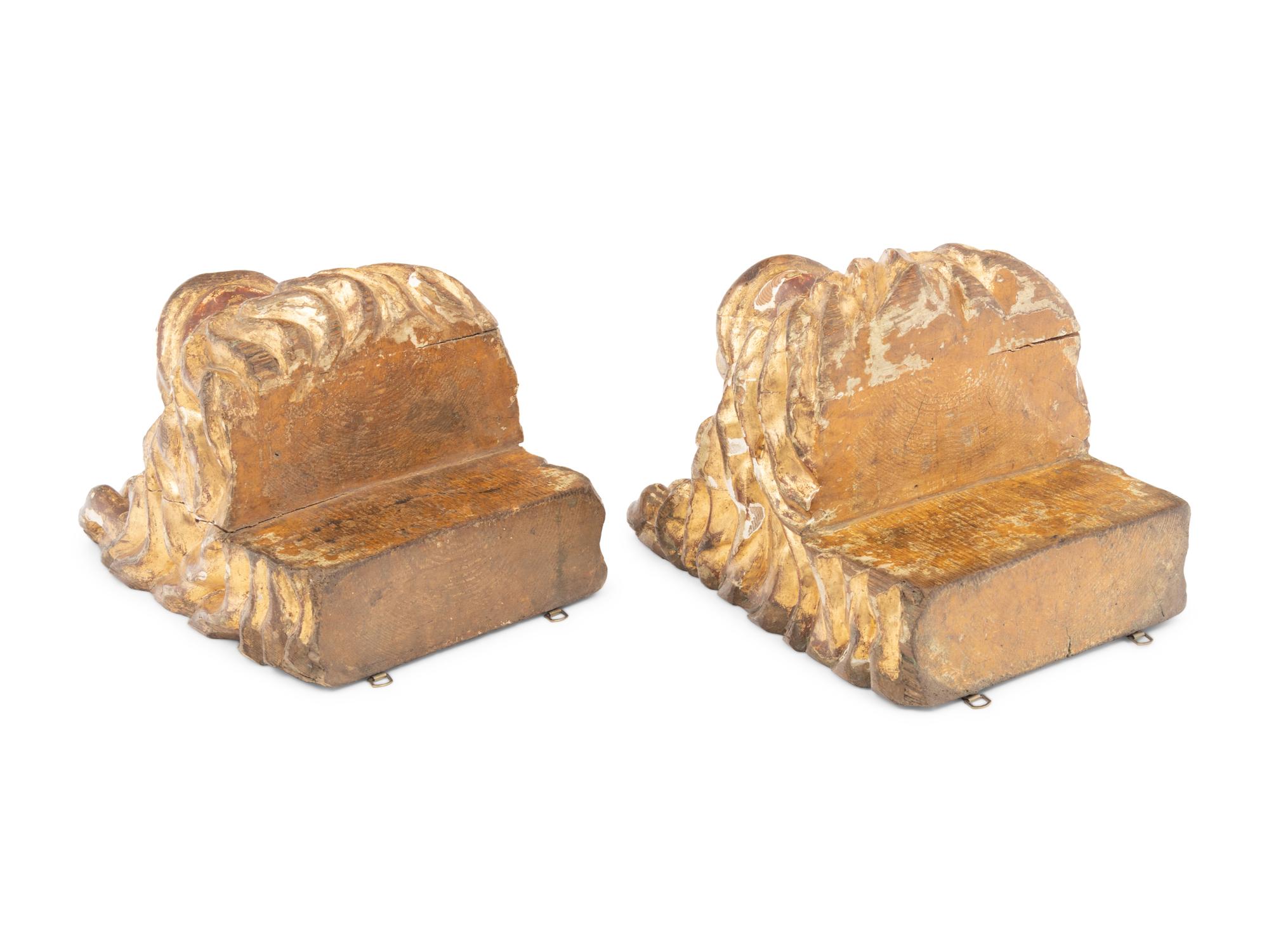 A Pair of Continental Carved Giltwood Lion Wall Brackets