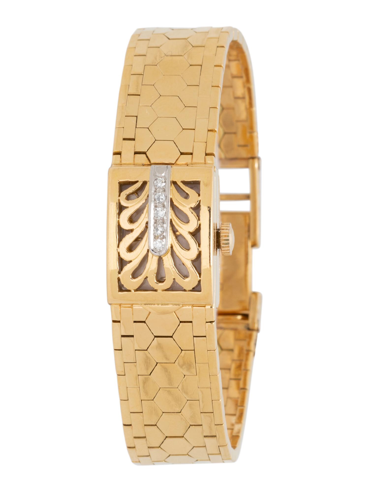 BUCHERER, 18K YELLOW GOLD AND DIAMOND SURPRISE WRISTWATCH