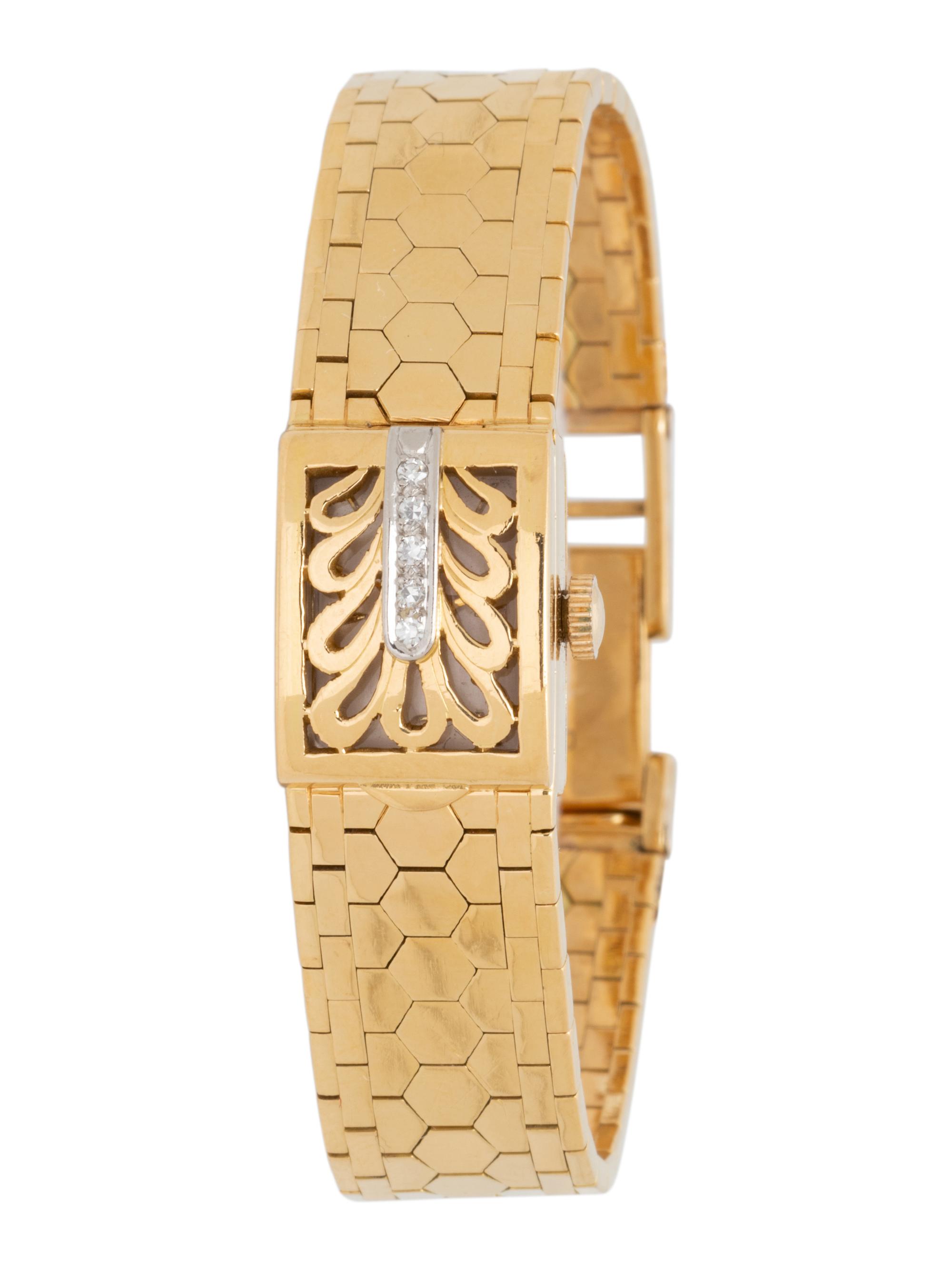 BUCHERER, 18K YELLOW GOLD AND DIAMOND SURPRISE WRISTWATCH