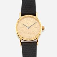 A gold coin wristwatch, Corum
