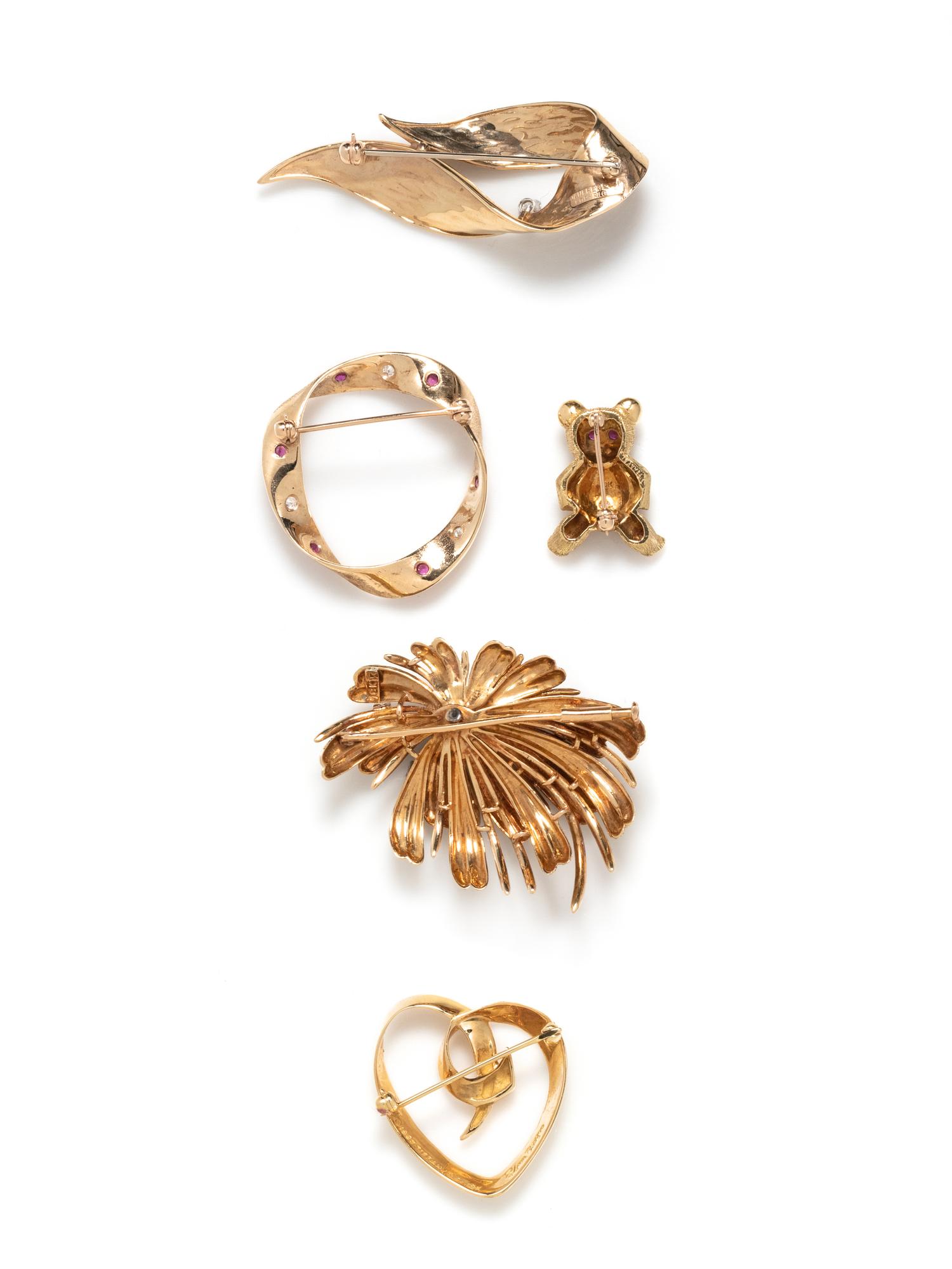 COLLECTION OF YELLOW GOLD BROOCHES