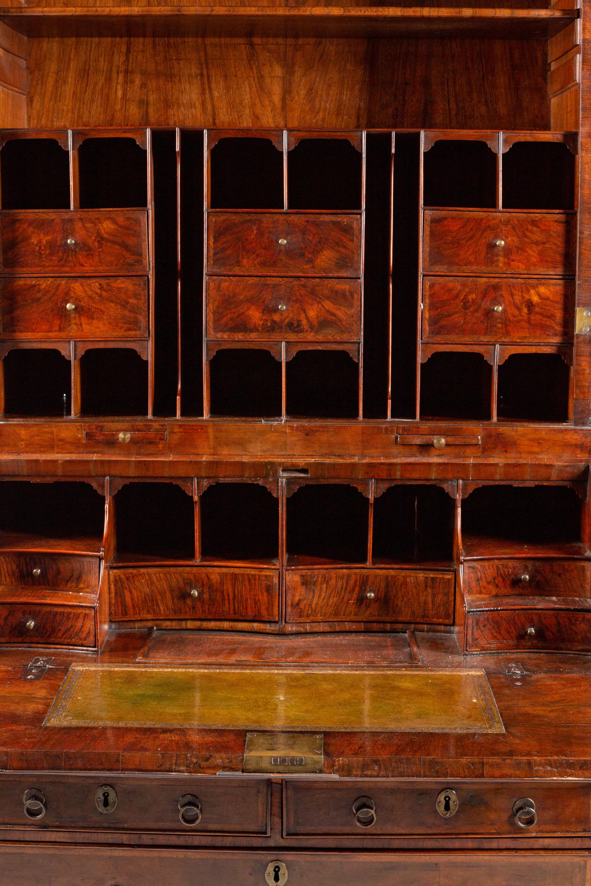 A George II Crossbanded Walnut Secretary Bookcase
