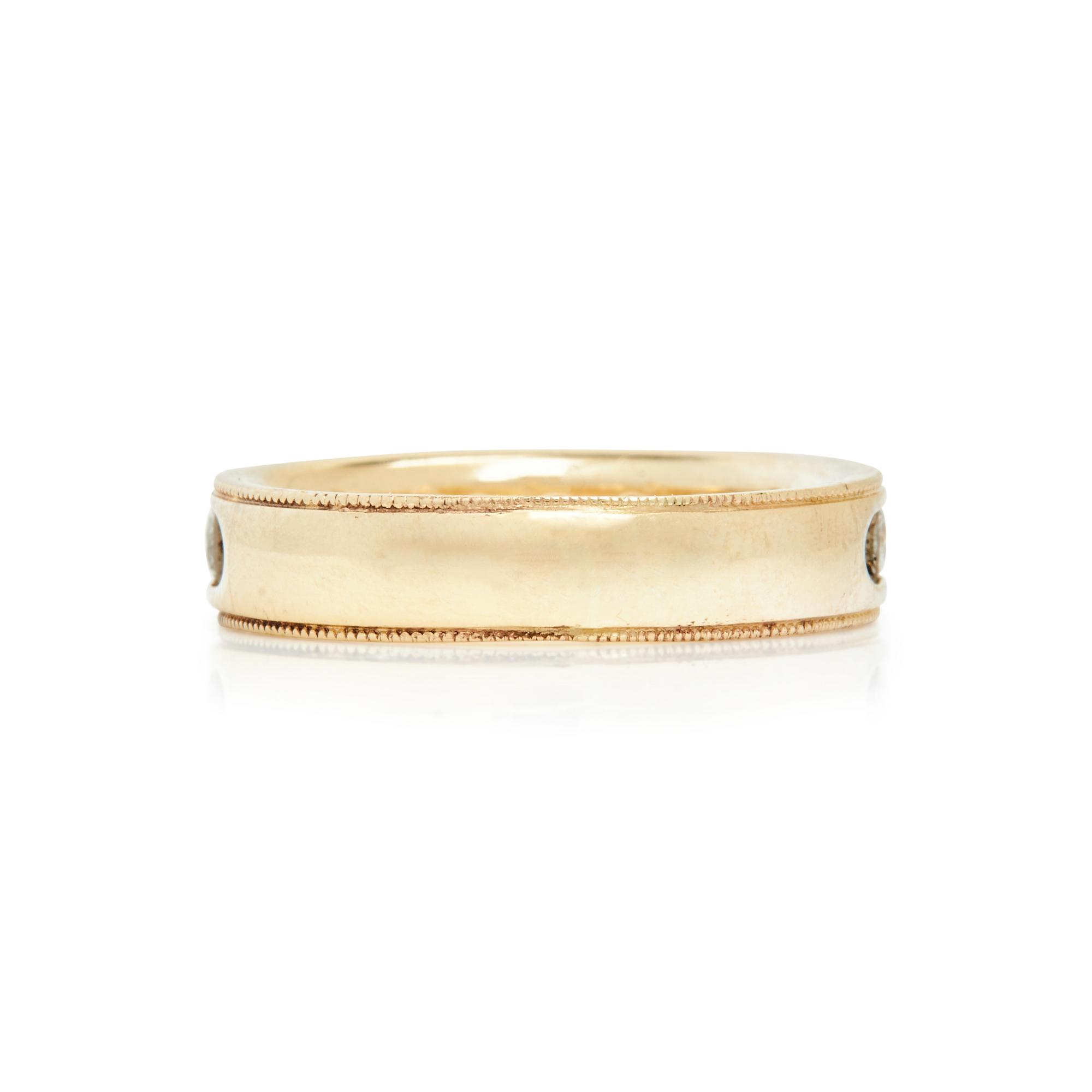 YELLOW GOLD AND DIAMOND BAND RING