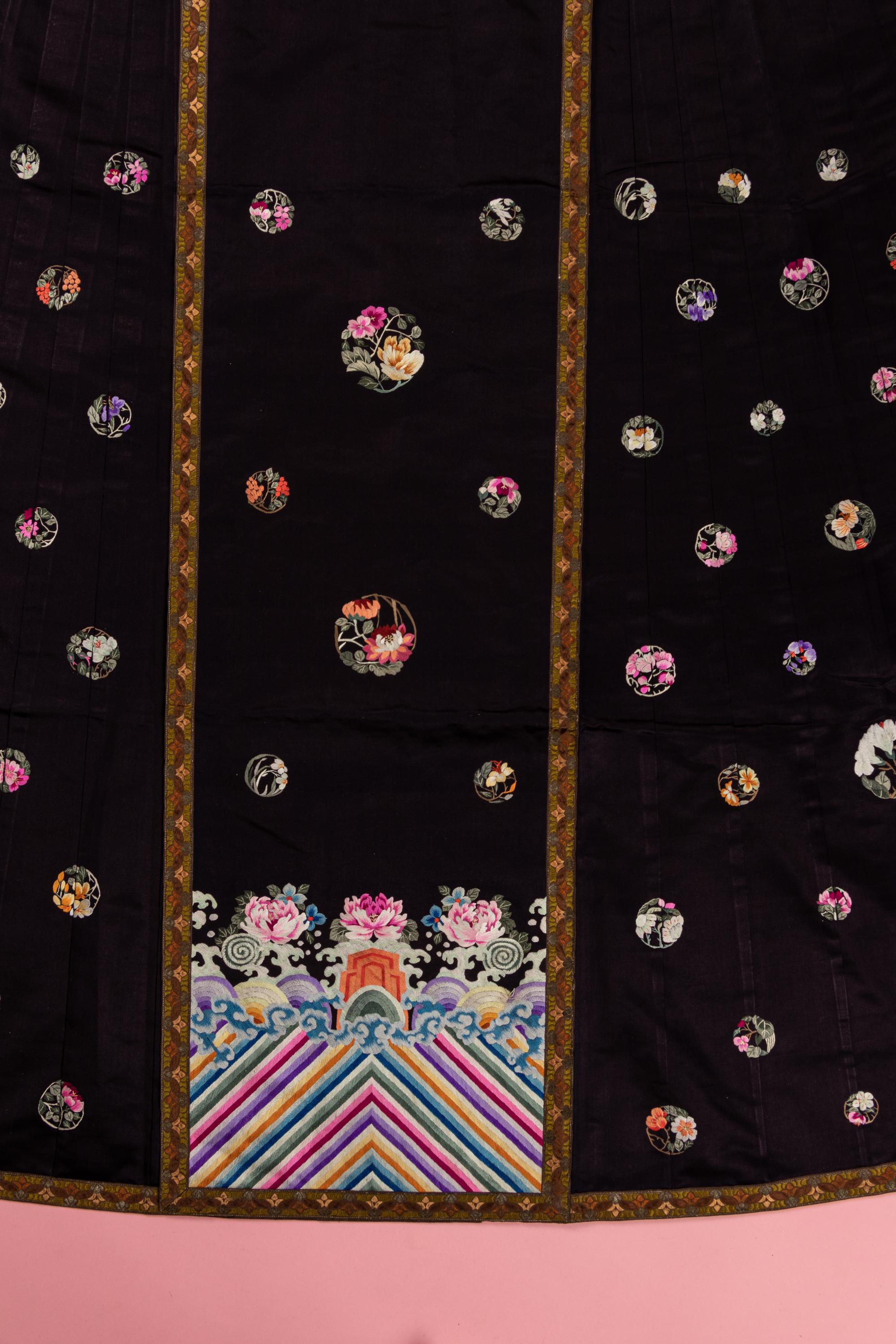 A Set of Aubergine Satin Ground Embroidered Silk Lady's Robe and Skirt