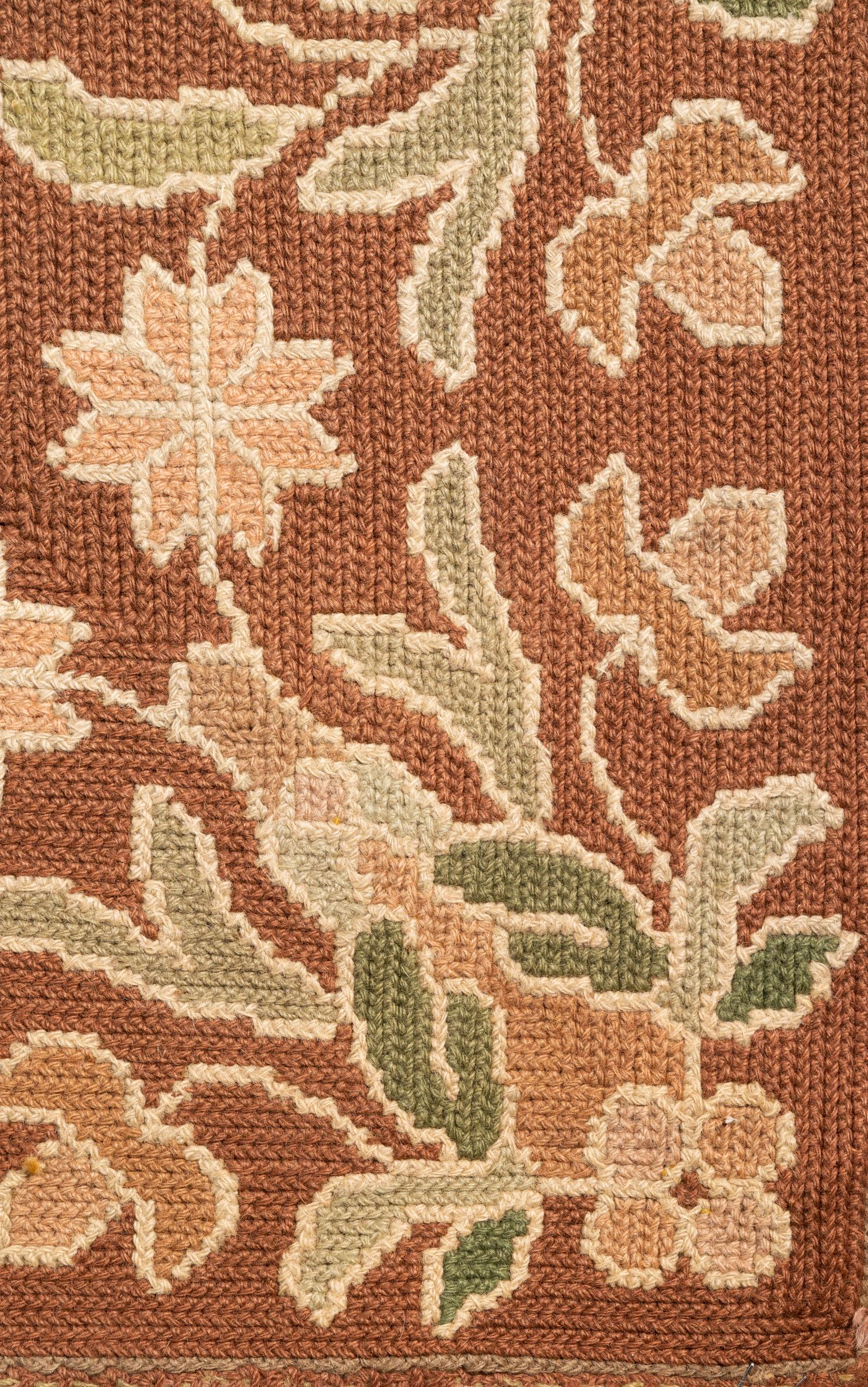 A Portuguese Needlepoint Rug