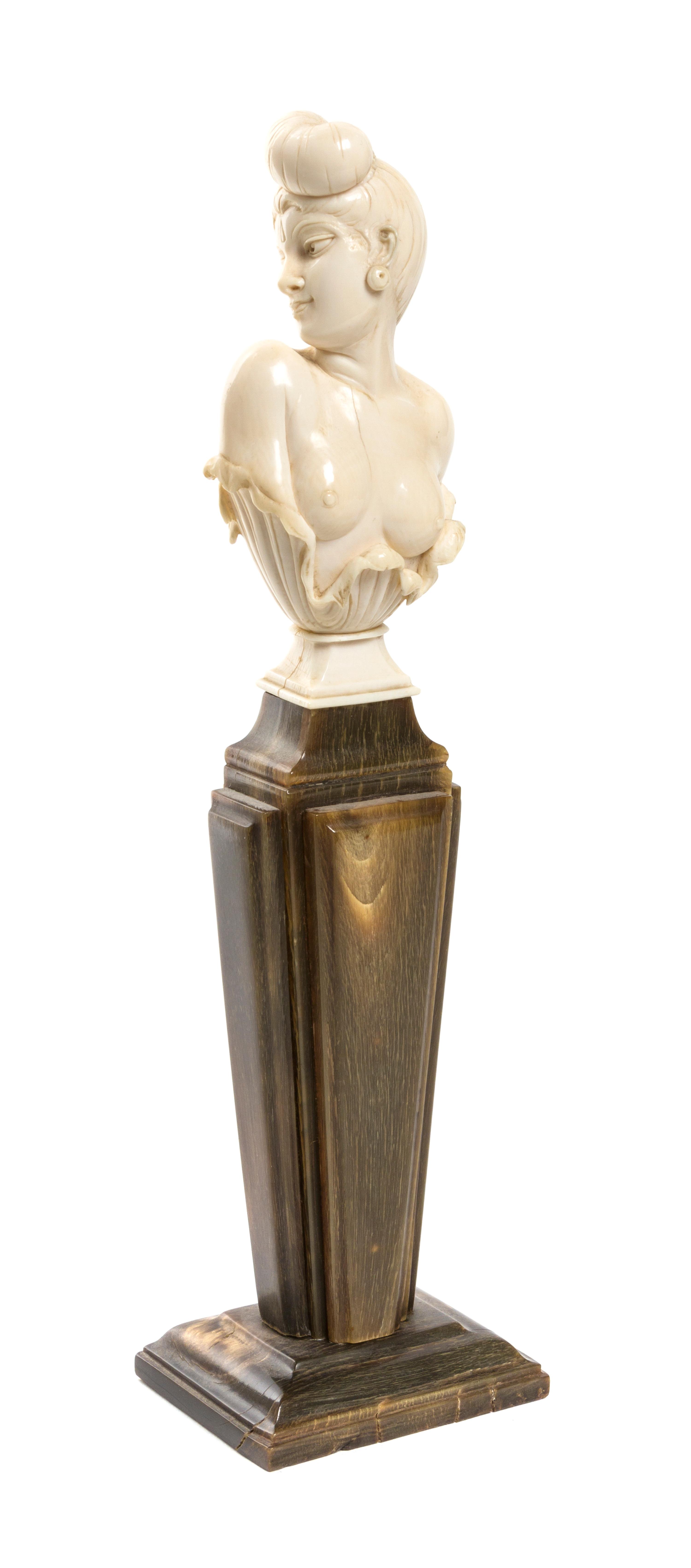A Continental Carved Ivory Bust, Height overall 9 5/8 inches.
