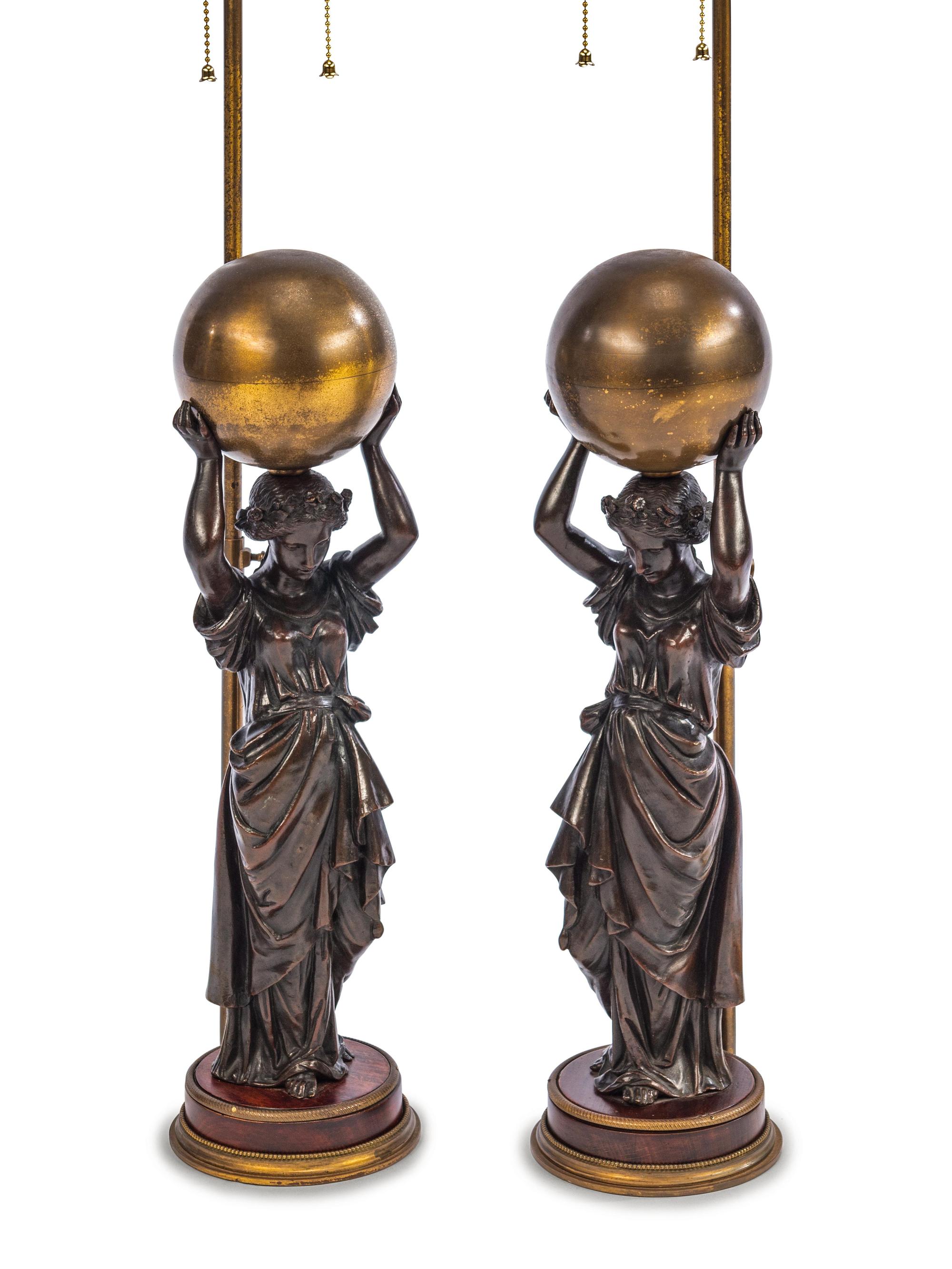 A Pair of French Gilt and Patinated Bronze Figures
