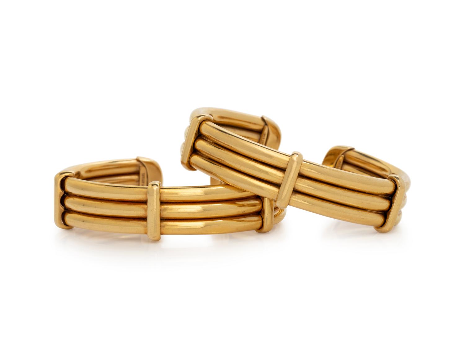 TIFFANY & CO., PAIR OF YELLOW GOLD CUFF BRACELETS