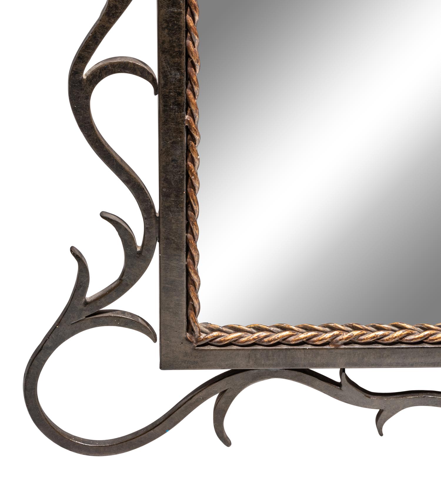 A French Gilt Metal and Iron Mirror After Gilbert Poillerat (French, 1902-1988)