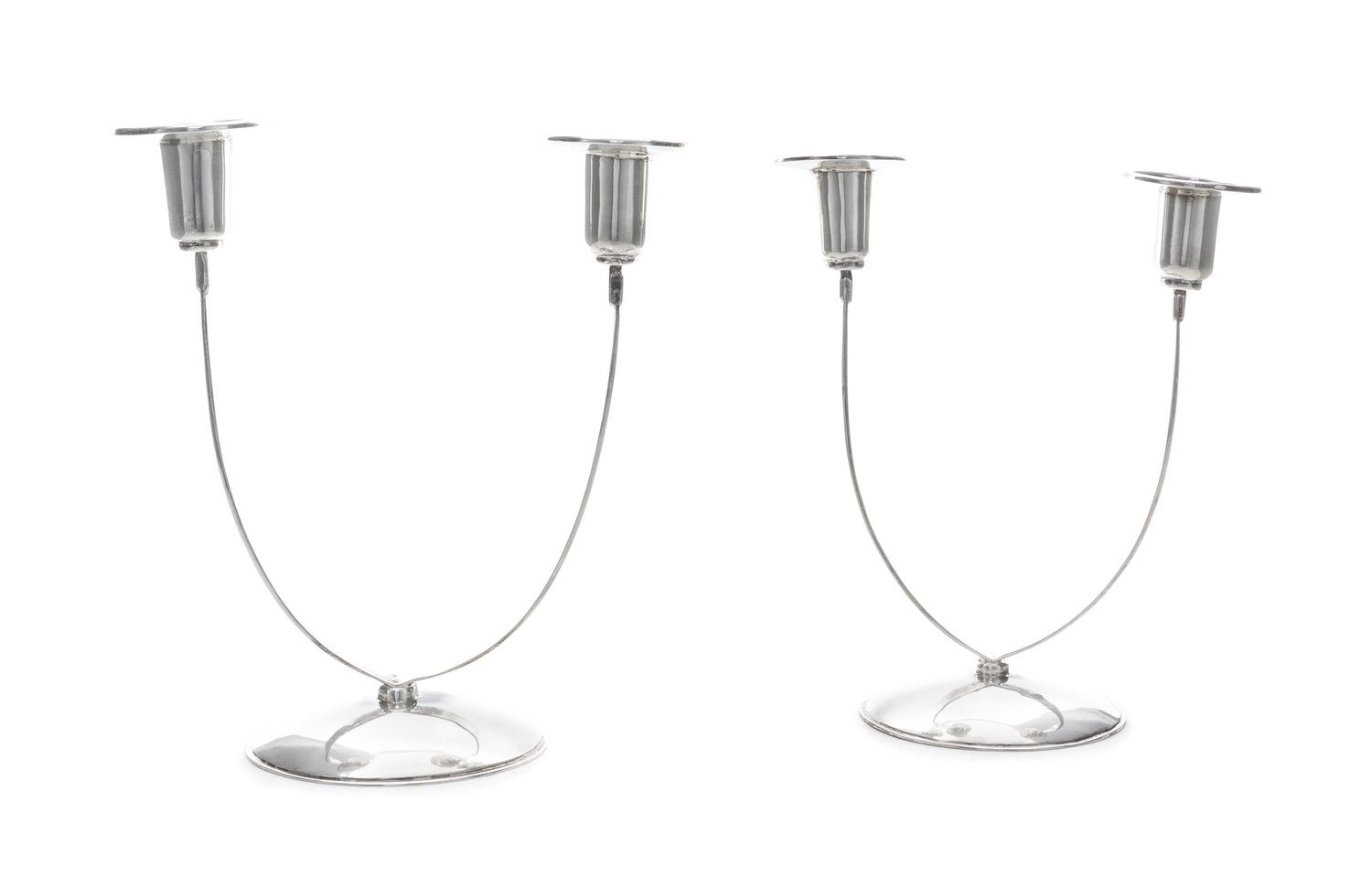A Pair of American Silver Two-Light Candelabra, William Seitz, New York, NY, 1970, each having a domed foot supporting two strap branch