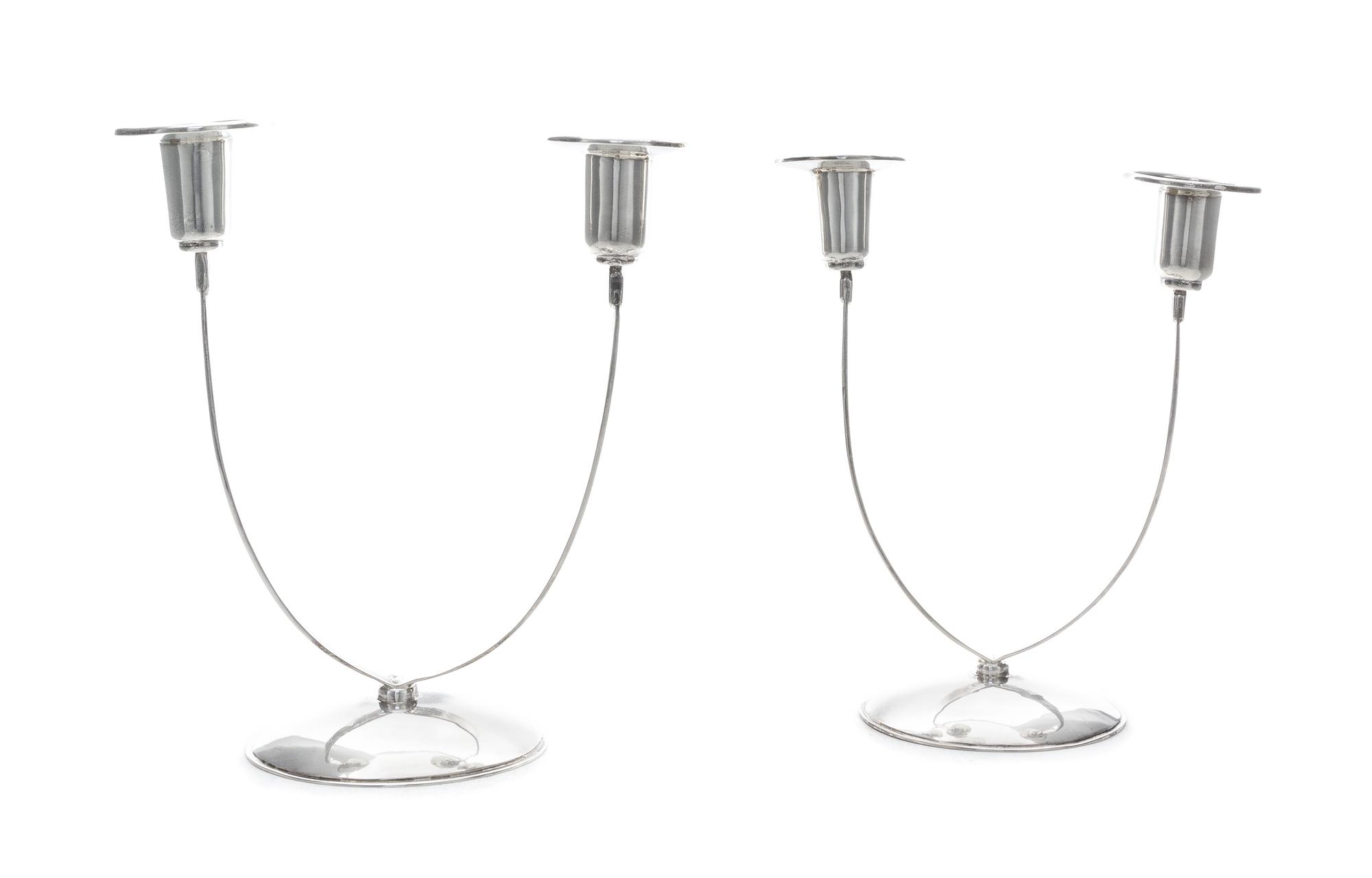A Pair of American Silver Two-Light Candelabra, William Seitz, New York, NY, 1970, each having a domed foot supporting two strap branch