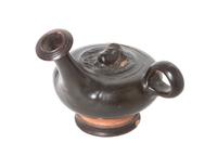 A Terracotta Spouted Vessel Height 5 1/2 x width 7 inches.