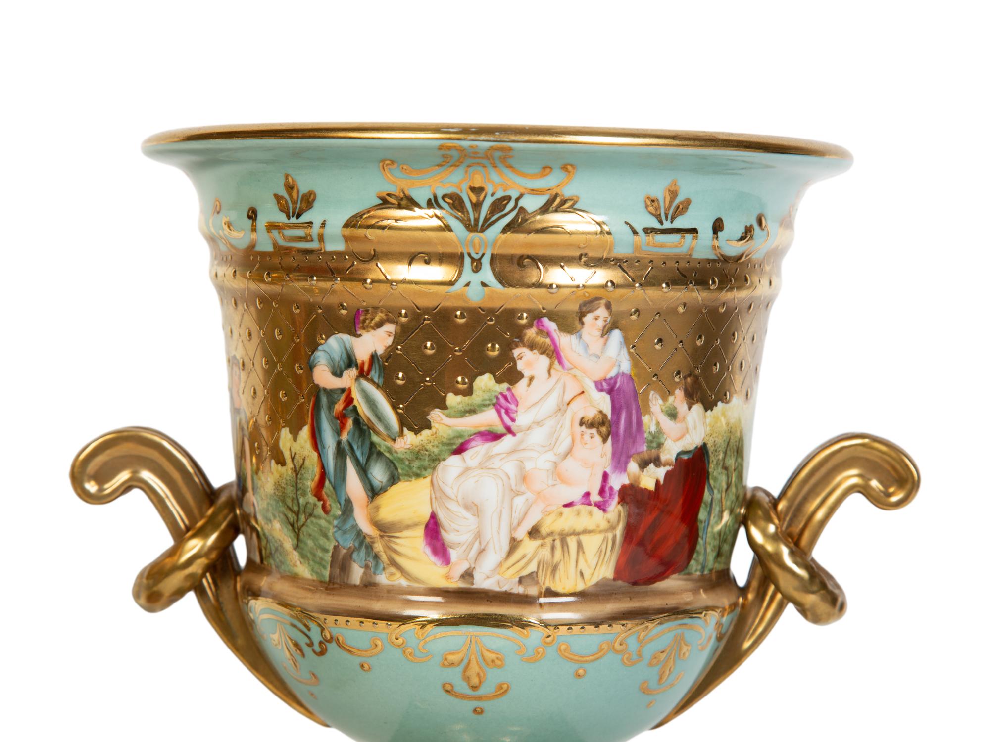 A Pair of Vienna Porcelain Urns with Classical Scenes