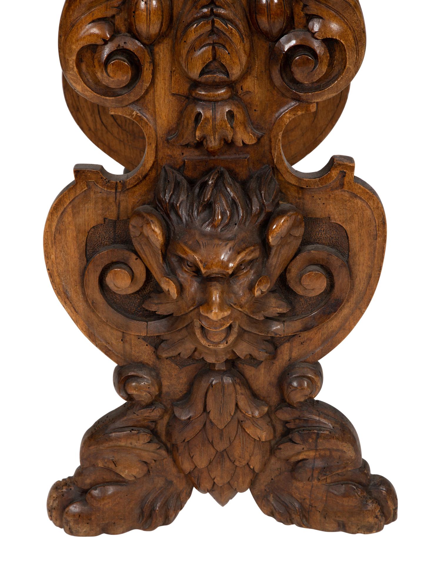 An Italian Renaissance Revival Carved Oak Sgabello Pedestal