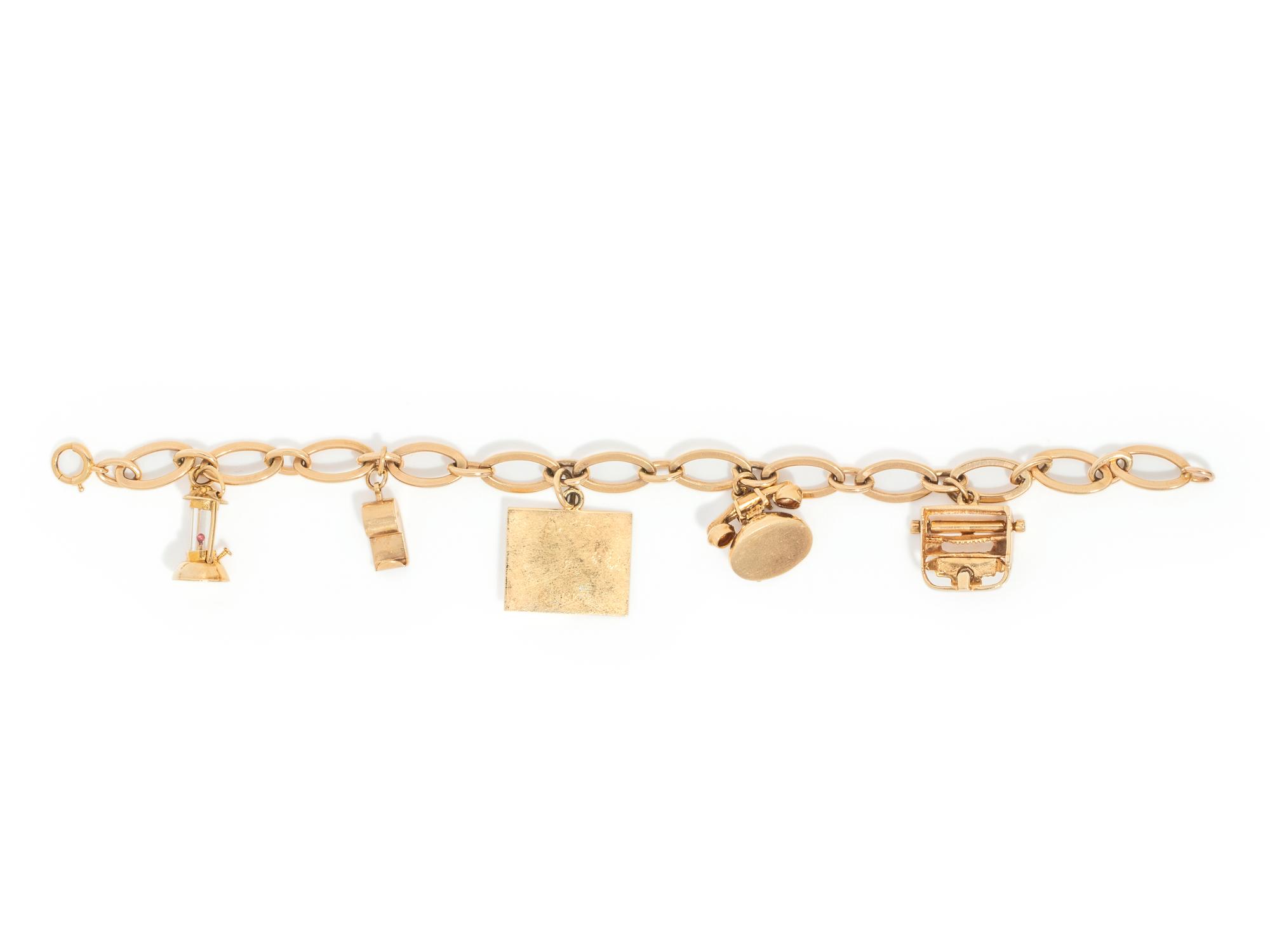 YELLOW GOLD CHARM BRACELET