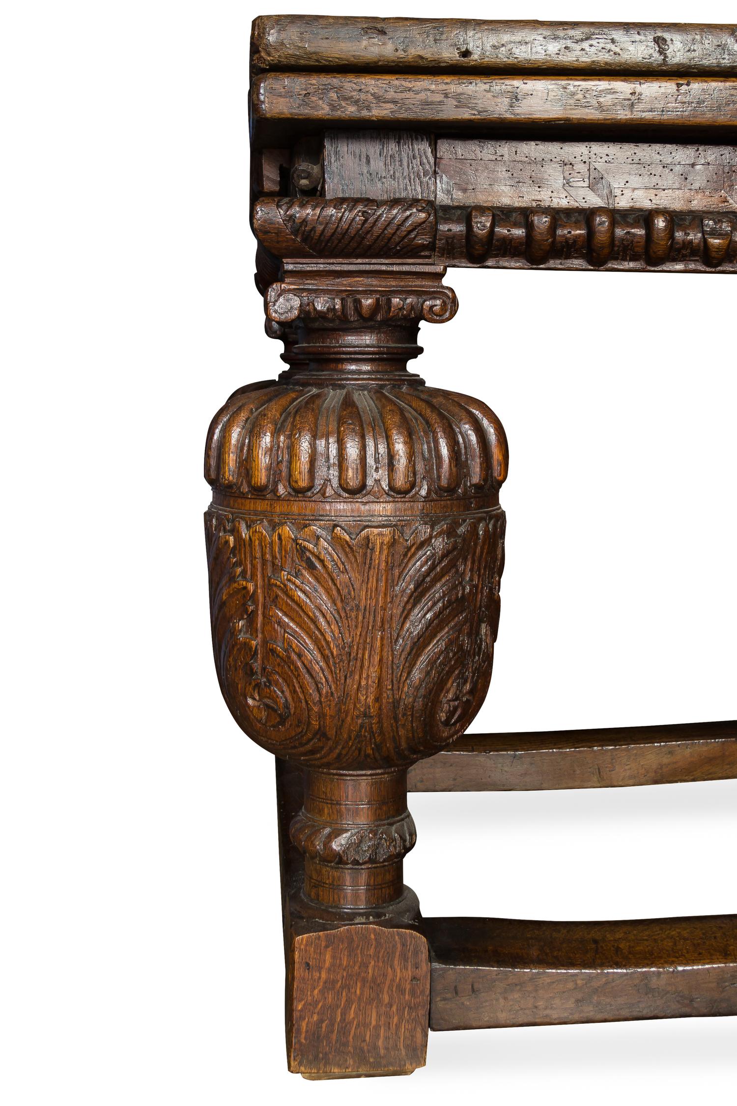 An English Oak Draw-Leaf Refectory Table Heigh 33 x width 92 1/2 x depth 36 inches (closed). — 17TH CENTURY