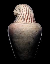 An Egyptian Painted Pottery Canopic Jar