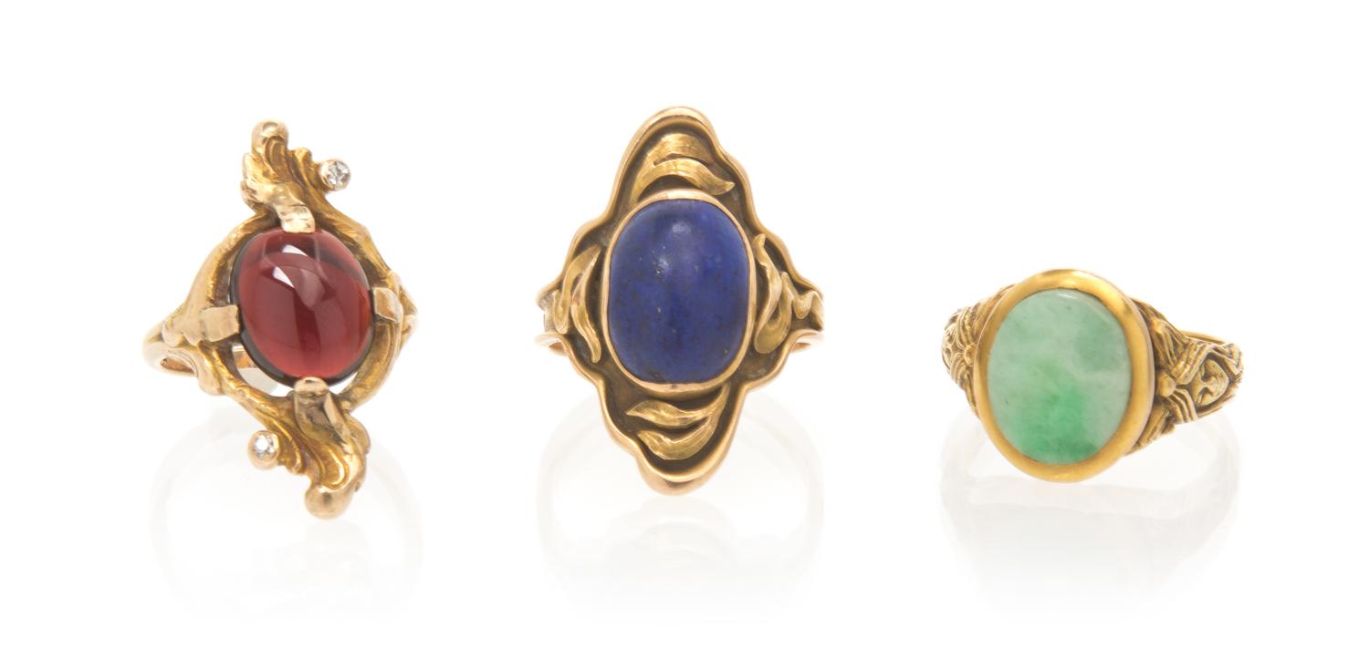 A Collection of Yellow Gold, Lapis, Garnet, Jade and Diamond Rings, 10.40 dwts.