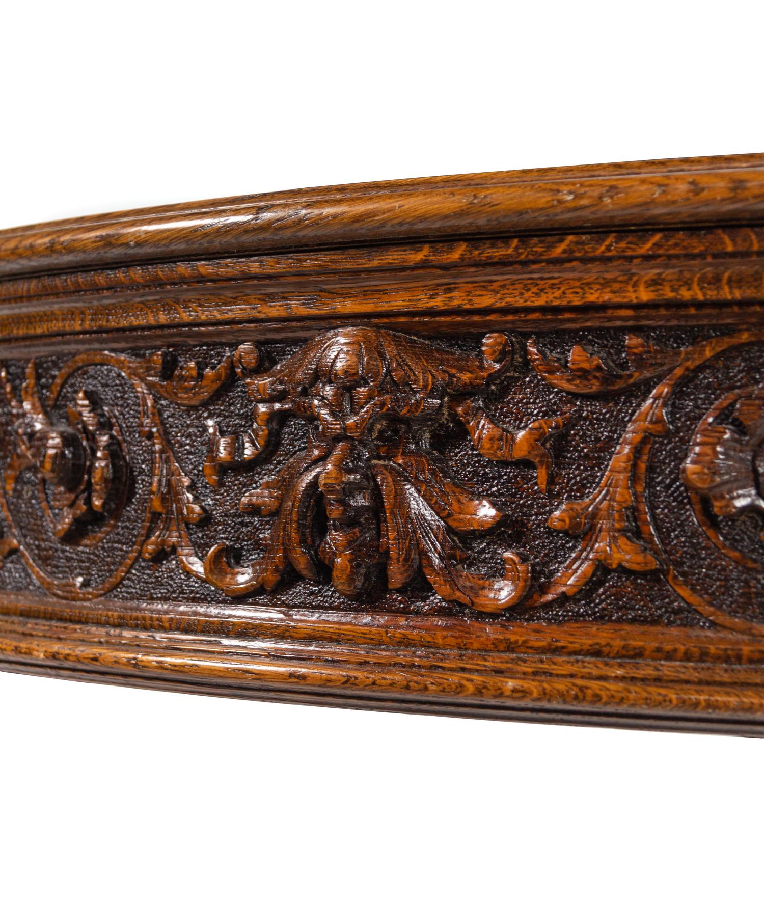 An R.J. Horner Carved Oak Man of the Mountain Dining Table