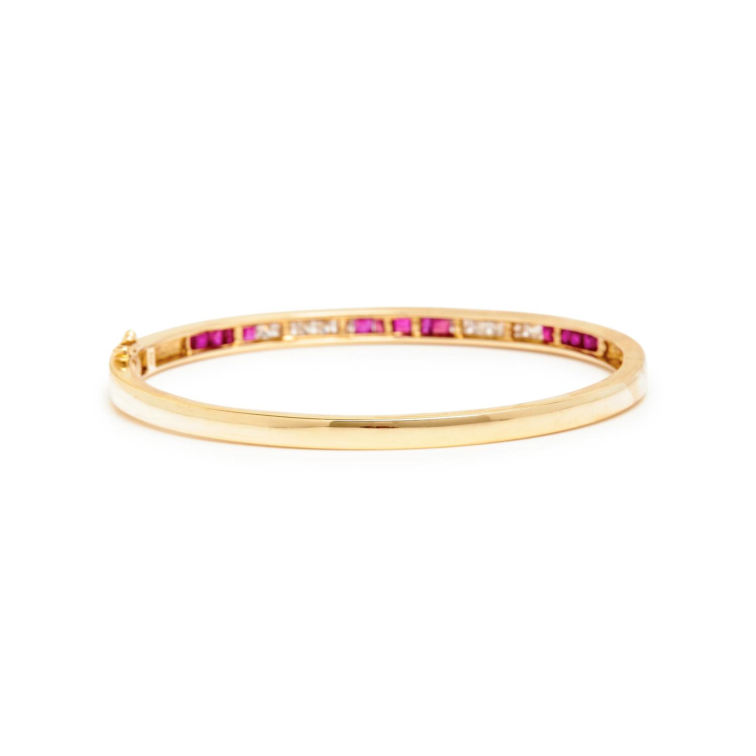 YELLOW GOLD, RUBY, EMERALD, AND DIAMOND BANGLES