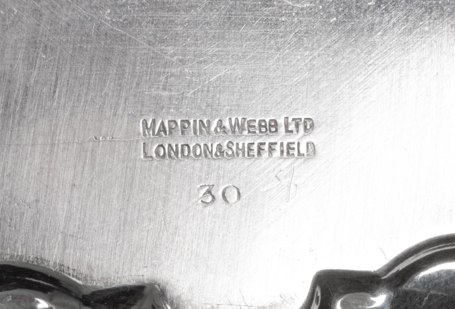 A Group of Four English Silver Waiters