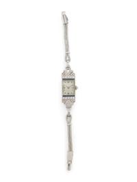 DIAMOND, SAPPHIRE, AND PLATINUM WATCH