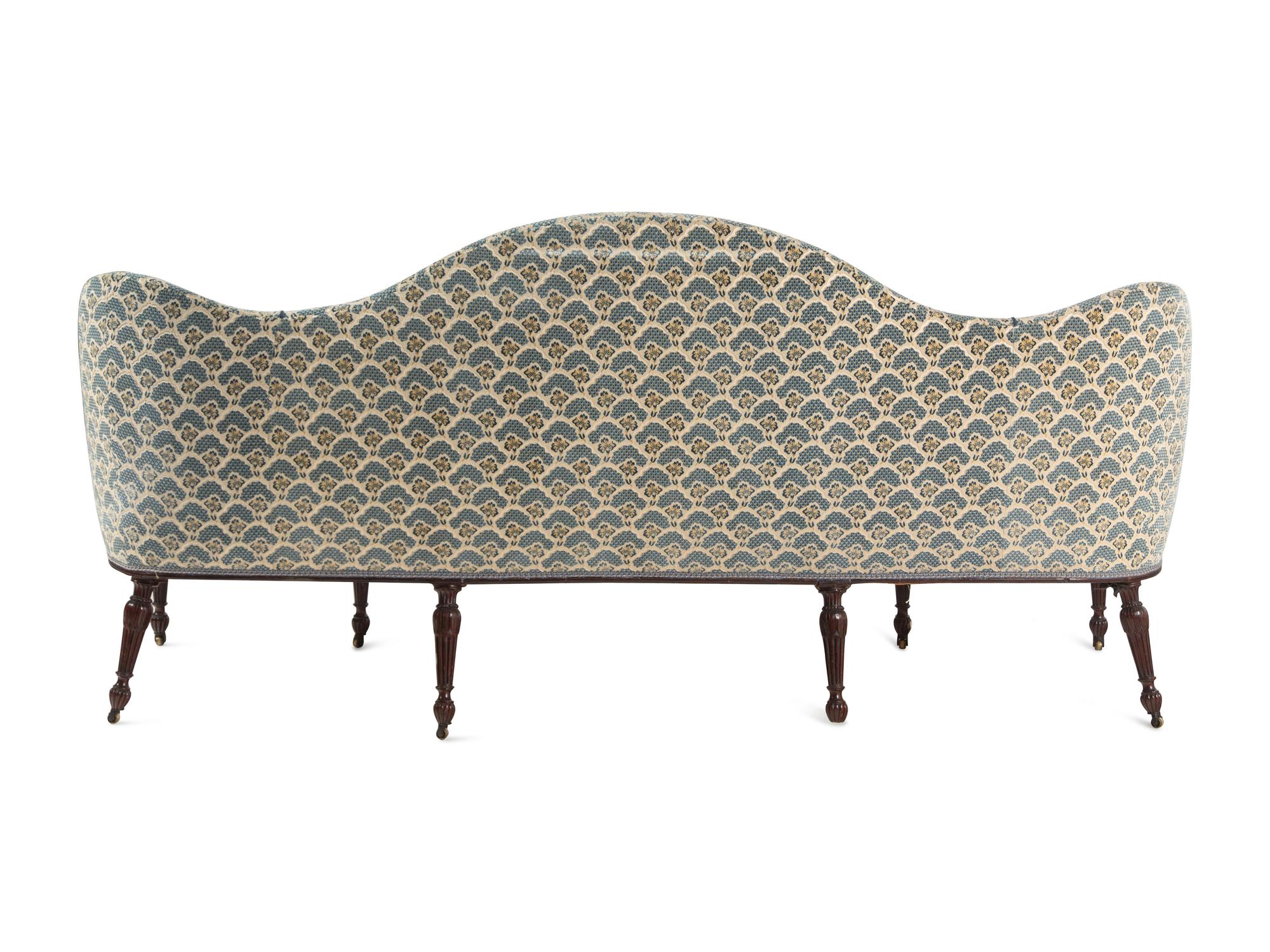 A George III Carved Mahogany Settee