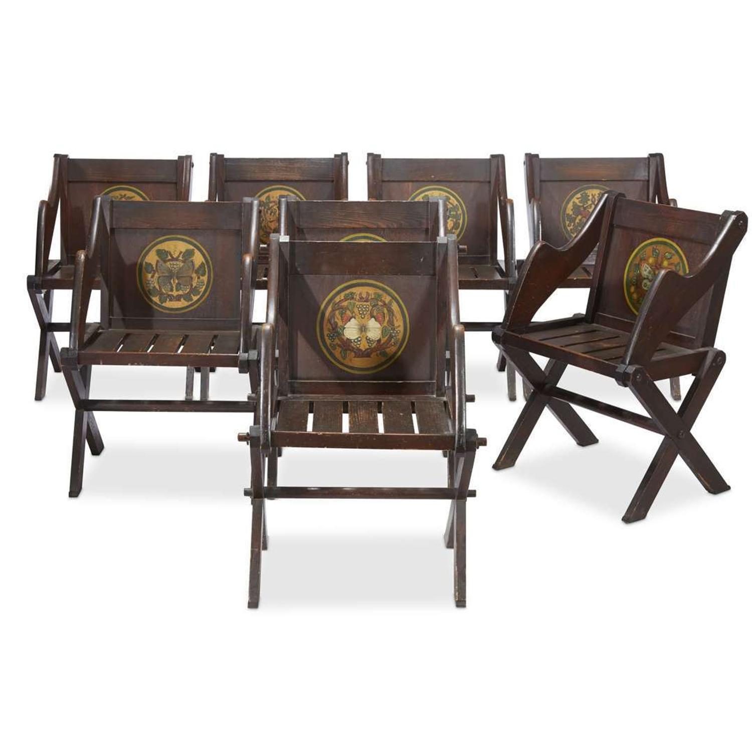 Set of eight stained and paint-decorated pine Gothic Revival 'Glastonbury-type' armchairs after a design by A.W. Pugin (1839-1841), circa 1900