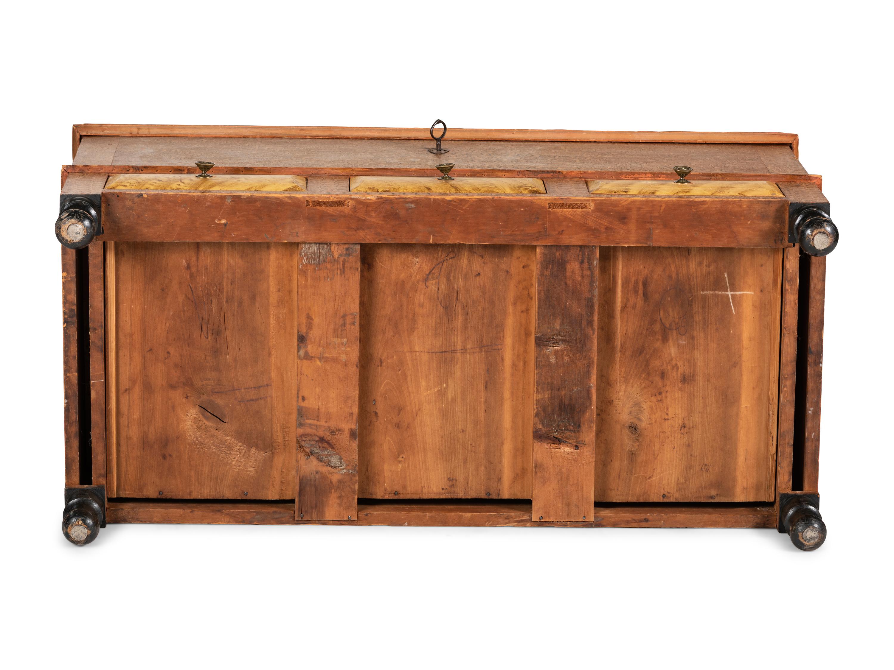 A Grain Paint Decorated and Part Ebonized Three-Drawer Blanket Chest