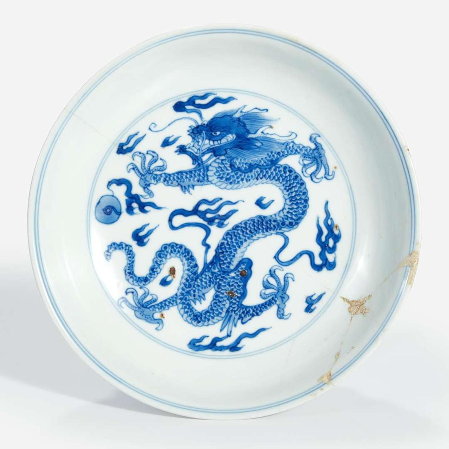 A Chinese blue and white porcelain "Dragon" dish Kangxi mark and period