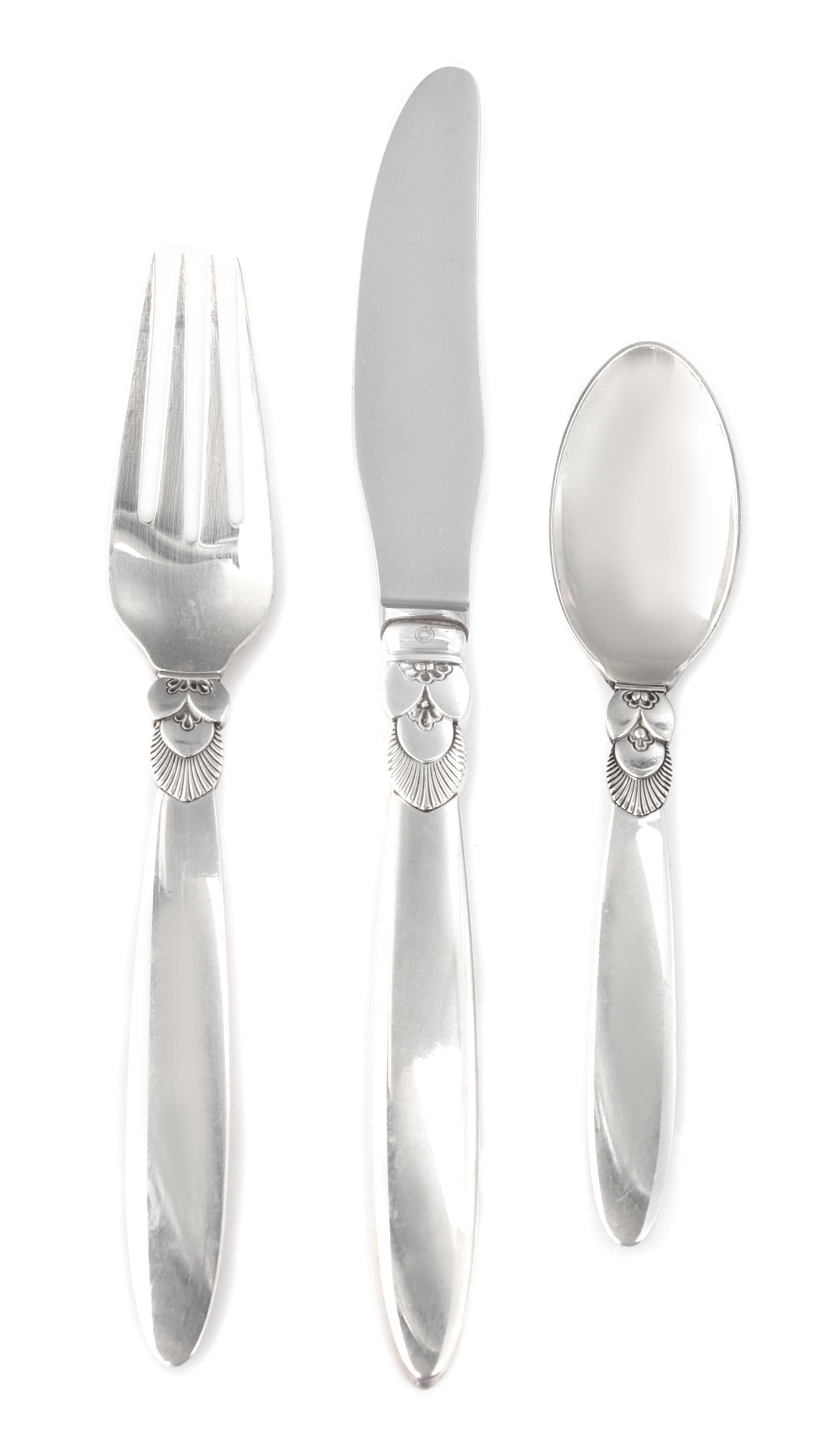 A Danish Silver Flatware Service, Georg Jensen Silversmithy, Copenhagen, 20th Century, Cactus pattern, comprising: 12 serrated blade di