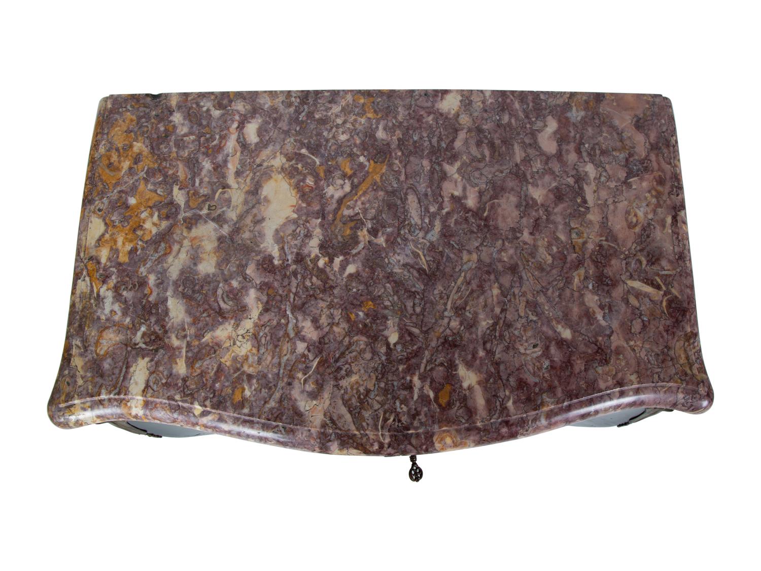A Transitional Louis XV/XVI Style Gilt Bronze Mounted Ebonized Marble-Top Commode